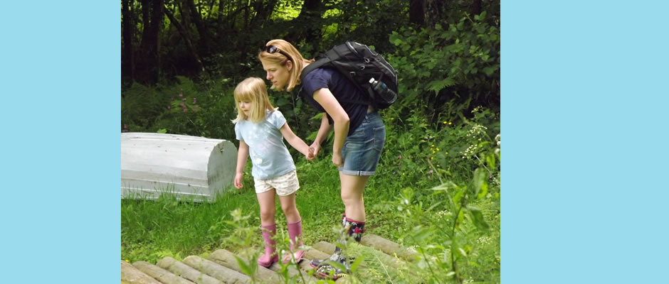 Children on holiday playing in the stream.